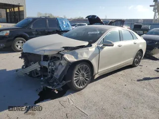 2016 Lincoln MKZ z VIN 3LN6L2G99GR610812, wystawiony jako Copart lot #52916045 z przebiegiem 181 235 mil mil oraz Szkoda całkowita • Salvage title. Historia ofert i sprzedaży dostępna na DreamBid. Obrazek 1.