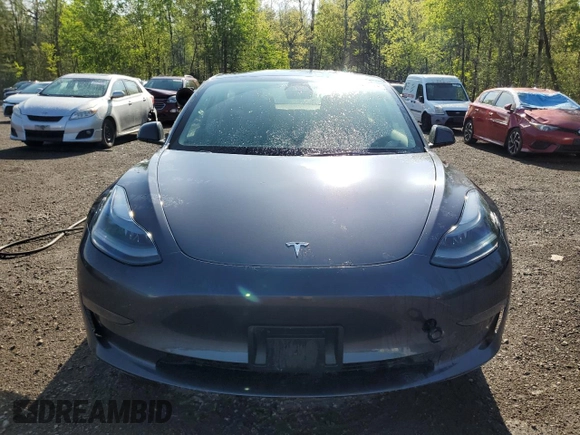 2023 Tesla Model 3 z VIN 5YJ3E1EAXPF404814, wystawiony jako Copart lot #56857105 z przebiegiem 59 360 mil mil oraz Czysty tytuł • Clean title. Historia ofert i sprzedaży dostępna na DreamBid. Obrazek 5.