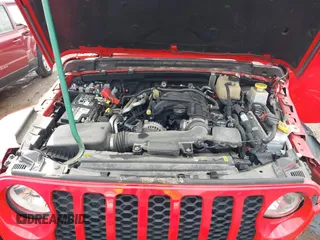 2021 Jeep Gladiator Freedom z VIN 1C6HJTAG0ML547293, wystawiony jako IAAI lot #41926067 z przebiegiem 57 696 mil mil oraz . Historia ofert i sprzedaży dostępna na DreamBid. Obrazek 10.