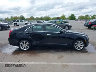 2014 Cadillac ATS Standard AWD z VIN 1G6AG5RX7E0131482, wystawiony jako IAAI lot #42188512 z przebiegiem 53 941 mil mil oraz . Historia ofert i sprzedaży dostępna na DreamBid. Obrazek 13.