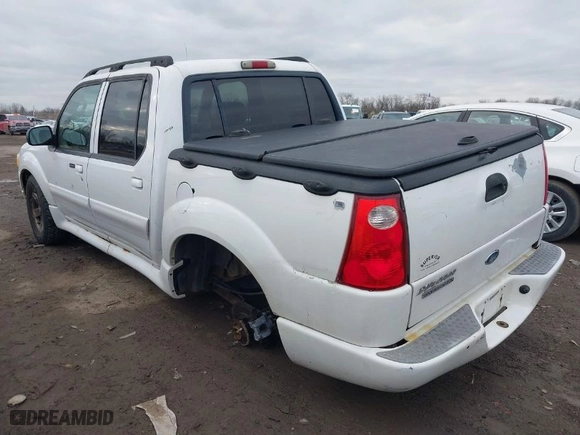 2005 Ford Explorer Sport Trac XLS with VIN 1FMZU77K85UB45651, listed as a IAAI auction lot 41911377 with 155,091 mi miles. Bid and sale history available at carsss.com. Image 3.
