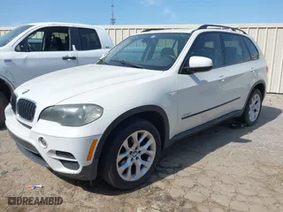2011 BMW X5 35i with VIN 5UXZV4C54BL410338, listed as a IAAI auction lot 41930266 with 148,950 mi miles. Bid and sale history available at carsss.com. Image 2.