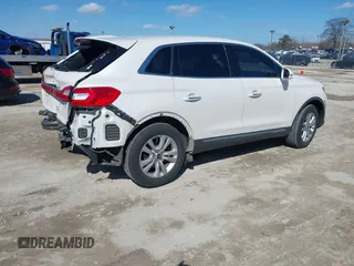 2018 Lincoln MKX Premiere z VIN 2LMPJ6JR7JBL45554, wystawiony jako IAAI lot #41866850 z przebiegiem 90 685 mil mil oraz . Historia ofert i sprzedaży dostępna na DreamBid. Obrazek 4.