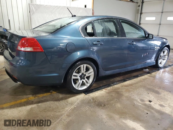 2009 Pontiac G8 with VIN 6G2ER57789L161792, listed as a Copart auction lot 43455795 with 127,236 mi miles and Salvage Title. Bid and sale history available at DreamBid. Image 3.