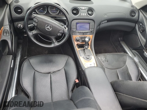 2008 Mercedes-Benz SL 550 with VIN WDBSK71FX8F141468, listed as a Copart auction lot 61036285 with 109,698 mi miles and Salvage title. Bid and sale history available at DreamBid. Image 8.