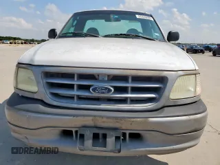 2003 Ford F-150 XL z VIN 1FTRF17263NB24929, wystawiony jako Copart lot #65346085 z przebiegiem 203 401 mil mil oraz Czysty tytuł • Clean title. Historia ofert i sprzedaży dostępna na DreamBid. Obrazek 5.
