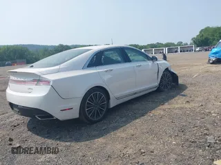 2016 Lincoln MKZ z VIN 3LN6L2JK8GR626690, wystawiony jako IAAI lot #42438226 z przebiegiem 51 678 mil mil oraz . Historia ofert i sprzedaży dostępna na DreamBid. Obrazek 4.