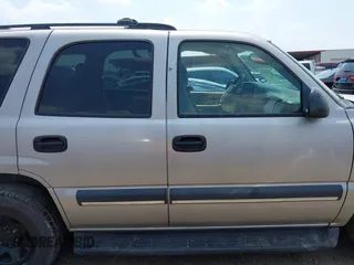 2004 Chevrolet Tahoe LS z VIN 1GNEC13T44R180732, wystawiony jako IAAI lot #42170904 z przebiegiem Nie podano mil oraz . Historia ofert i sprzedaży dostępna na DreamBid. Obrazek 14.