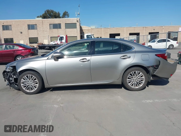 2015 Lexus ES with VIN JTHBK1GG3F2196961, listed as a IAAI auction lot 42003591 with 82,580 mi miles. Bid and sale history available at carsss.com. Image 14.