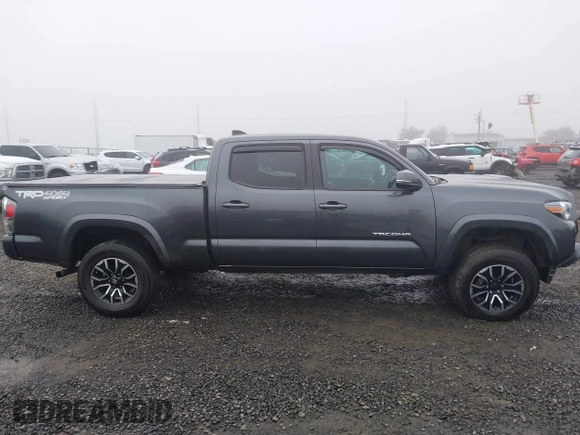 2021 Toyota Tacoma 4WD SR5 with VIN 3TMDZ5BN4MM099423, listed as a IAAI auction lot 41208397 with 62,935 mi miles. Bid and sale history available at carsss.com. Image 14.