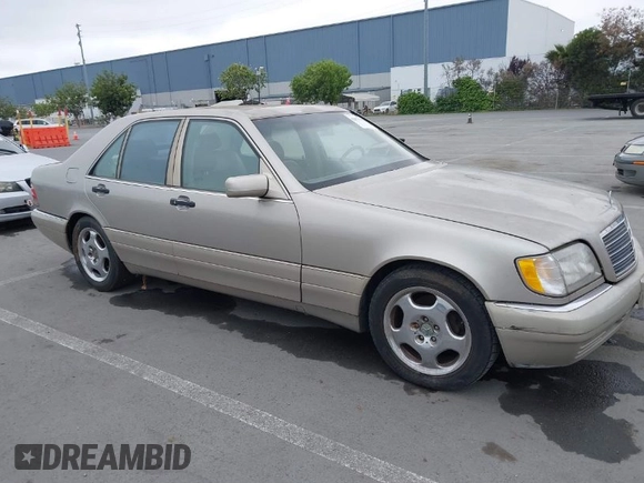 1997 Mercedes-Benz S-Class with VIN WDBGA32G1VA349367, listed as a IAAI auction lot 42079132 with 383,250 mi miles. Bid and sale history available at carsss.com. Image 1.