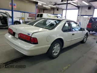 1995 Ford Thunderbird LX with VIN 1FALP62W9SH159185, listed as a Copart auction lot 51862975 with 128,230 mi miles and Clean Title. Bid and sale history available at carsss.com. Image 3.