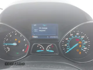 2014 Ford Escape SE with VIN 1FMCU9G97EUC50213, listed as a IAAI auction lot 42130075 with 235,406 mi miles. Bid and sale history available at carsss.com. Image 7.