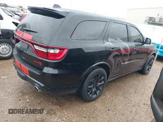 2023 Dodge Durango SRT Hellcat Premium with VIN 1C4SDJH99PC584770, listed as a IAAI auction lot 41562157 with 14,598 mi miles and . Bid and sale history available at DreamBid. Image 4.