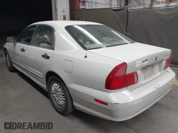 1999 Mitsubishi Diamante z VIN 6MMAP47P4XT003895, wystawiony jako IAAI lot #41992452 z przebiegiem 170 964 mil mil oraz . Historia ofert i sprzedaży dostępna na DreamBid. Obrazek 3.