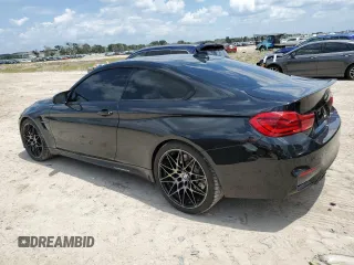 2018 BMW M4 with VIN WBS4Y9C51JAC86230, listed as a Copart auction lot 67757584 with 42,704 mi miles and Salvage Title. Bid and sale history available at carsss.com. Image 2.