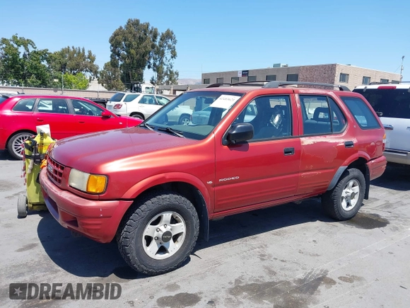 1999 Isuzu Rodeo S z VIN 4S2CK58W4X4362837, wystawiony jako IAAI lot #42403621 z przebiegiem 177 690 mil mil oraz . Historia ofert i sprzedaży dostępna na DreamBid. Obrazek 6.