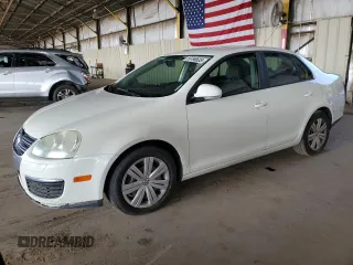 2008 Volkswagen Jetta S z VIN 3VWJM71K68M177594, wystawiony jako Copart lot #59760635 z przebiegiem 151 446 mil mil oraz Czysty tytuł • Clean title. Historia ofert i sprzedaży dostępna na DreamBid. Obrazek 1.