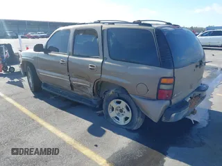2004 Chevrolet Tahoe LT with VIN 1GNEC13Z24J170834, listed as a IAAI auction lot 41149637 with 362,679 mi miles and . Bid and sale history available at DreamBid. Image 3.