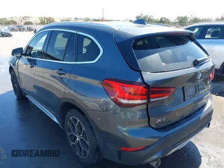2020 BMW X1 sDrive28i with VIN WBXJG7C0XL3L92799, listed as a IAAI auction lot 41752133 with 92,328 mi miles. Bid and sale history available at carsss.com. Image 3.