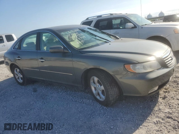 2007 Hyundai Azera SE z VIN KMHFC46FX7A178714, wystawiony jako Copart lot #49264985 z przebiegiem 89 266 mil mil oraz Szkody całkowita. Historia ofert i sprzedaży dostępna na DreamBid. Obrazek 4.