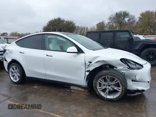 2022 Tesla Model Y Long Range with VIN 7SAYGDEE3NF380067, listed as a IAAI auction lot 41016704 with 52,180 mi miles and . Bid and sale history available at DreamBid. Image 13.