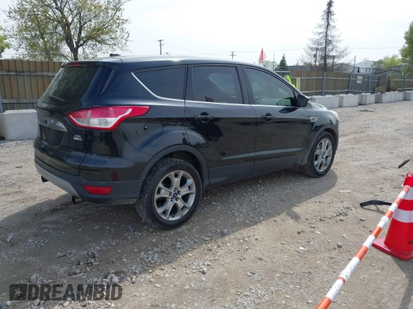 2013 Ford Escape SEL with VIN 1FMCU9H92DUA45282, listed as a IAAI auction lot 42184946 with 96,512 mi miles and . Bid and sale history available at DreamBid. Image 4.