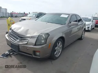 2003 Cadillac CTS with VIN 1G6DM57N730116792, listed as a IAAI auction lot 41686845 with 121,590 mi miles. Bid and sale history available at carsss.com. Image 2.
