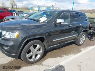 2011 Jeep Grand Cherokee Limited with VIN 1J4RR5GG4BC624876, listed as a IAAI auction lot 41877272 with 166,810 mi miles. Bid and sale history available at carsss.com. Image 18.