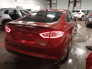 2014 Ford Fusion Titanium with VIN 3FA6P0K97ER324027, listed as a IAAI auction lot 41327141 with 161,045 mi miles and . Bid and sale history available at DreamBid. Image 4.