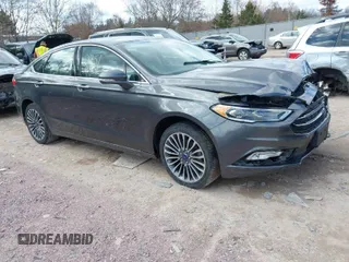 2017 Ford Fusion SE z VIN 3FA6P0HD8HR245319, wystawiony jako IAAI lot #41882451 z przebiegiem 87 246 mil mil oraz . Historia ofert i sprzedaży dostępna na DreamBid. Obrazek 1.