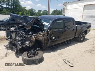 2020 Toyota Tacoma SR5 with VIN 3TMDZ5BN8LM090576, listed as a Copart auction lot 62217495 with 29,996 mi miles and Salvage title. Bid and sale history available at DreamBid. Image 1.