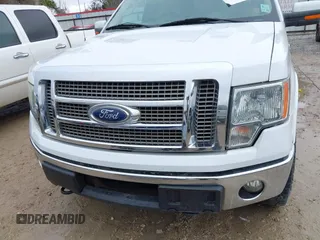 2011 Ford F-150 XLT with VIN 1FTFW1ET0BFD21778, listed as a IAAI auction lot 41382137 with 164,722 mi miles and . Bid and sale history available at DreamBid. Image 13.