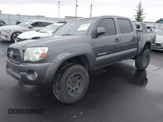 2011 Toyota Tacoma PreRunner with VIN 3TMJU4GN0BM119829, listed as a IAAI auction lot 40896155 with 121,860 mi miles and . Bid and sale history available at DreamBid. Image 2.