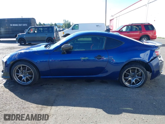 2013 Scion FR-S with VIN JF1ZNAA11D2702415, listed as a IAAI auction lot 40381041 with 63,581 mi miles. Bid and sale history available at carsss.com. Image 14.