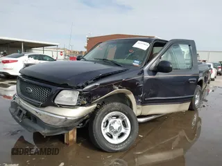 2000 Ford F-150 XL with VIN 1FTRX17L2YNB85627, listed as a IAAI auction lot 41377814 with 123,740 mi miles. Bid and sale history available at carsss.com. Image 19.