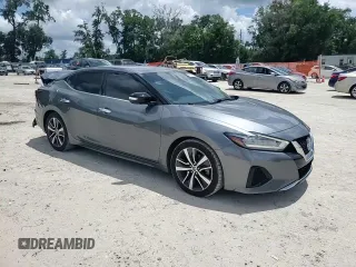 2020 Nissan Maxima SV with VIN 1N4AA6CV2LC364053, listed as a Copart auction lot 61956855 with 110,396 mi miles and Salvage title. Bid and sale history available at DreamBid. Image 13.