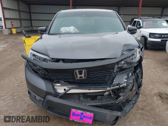2021 Honda Passport Sport with VIN 5FNYF8H26MB032206, listed as a IAAI auction lot 42282932 with 18,952 mi miles and . Bid and sale history available at DreamBid. Image 12.