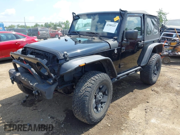 2015 Jeep Wrangler Freedom Edition с VIN 1C4AJWAG0FL520027, выставлен на аукционе IAAI как лот 42585222 с пробегом 78 980 миль миль и . История ставок и продаж доступна на DreamBid. Изображение 2.