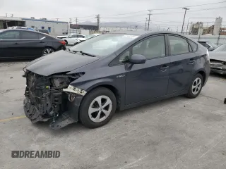 2015 Toyota Prius Four with VIN JTDKN3DUXF0436677, listed as a Copart auction lot 61992785 with 176,600 mi miles and Salvage title. Bid and sale history available at DreamBid. Image 1.