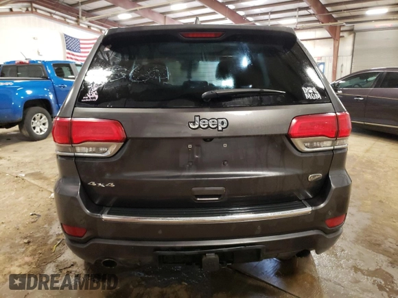2017 Jeep Grand Cherokee Overland z VIN 1C4RJFCG3HC638205, wystawiony jako Copart lot #53424655 z przebiegiem 175 318 mil mil oraz Czysty tytuł • Clean title. Historia ofert i sprzedaży dostępna na DreamBid. Obrazek 6.
