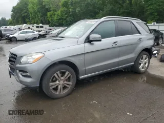 2012 Mercedes-Benz M 350 with VIN 4JGDA5HB9CA003457, listed as a Copart auction lot 60909255 with 51,290 mi miles and Salvage title. Bid and sale history available at DreamBid. Image 1.
