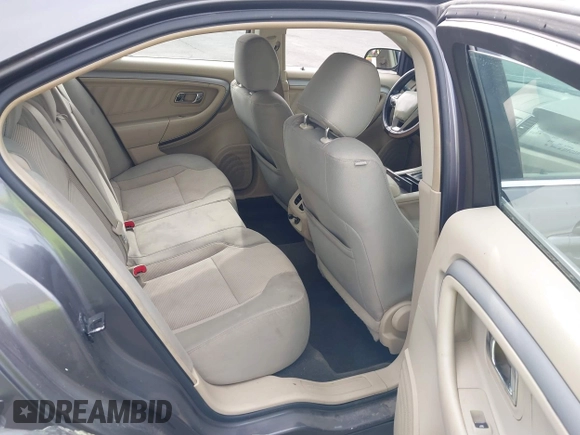 2013 Ford Taurus SEL with VIN 1FAHP2E82DG230831, listed as a IAAI auction lot 42078978 with 207,075 mi miles and . Bid and sale history available at carsss.com. Image 8.