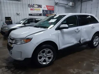 2014 Ford Edge SEL z VIN 2FMDK4JC9EBB06783, wystawiony jako IAAI lot #42047206 z przebiegiem 125 963 mil mil oraz . Historia ofert i sprzedaży dostępna na DreamBid. Obrazek 2.