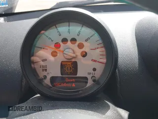 2014 MINI Countryman S with VIN WMWZC5C54EWM17299, listed as a IAAI auction lot 41655370 with 104,264 mi miles and . Bid and sale history available at DreamBid. Image 7.