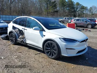 2022 Tesla Model X Plaid with VIN 7SAXCBE64NF352928, listed as a IAAI auction lot 41406070 with 38,175 mi miles and . Bid and sale history available at DreamBid. Image 1.