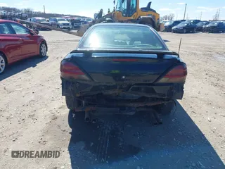 2004 Pontiac Grand Am GT with VIN 1G2NW52E74M683389, listed as a IAAI auction lot 41810159 with 227,091 mi miles. Bid and sale history available at carsss.com. Image 17.