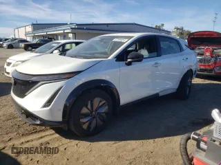2023 Nissan ARIYA Platinum+ z VIN JN1DF0CD9PM709899, wystawiony jako Copart lot #87288824 z przebiegiem 12 375 mil mil oraz Szkody całkowita. Historia ofert i sprzedaży dostępna na DreamBid. Obrazek 1.
