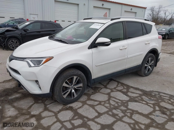 2018 Toyota RAV4 XLE with VIN JTMRFREV6JJ734927, listed as a IAAI auction lot 41510616 with 119,687 mi miles. Bid and sale history available at carsss.com. Image 17.