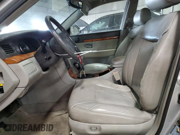 2005 Kia Amanti z VIN KNALD124755058346, wystawiony jako Copart lot #41683255 z przebiegiem 180 396 mil mil oraz Szkoda całkowita • Salvage title. Historia ofert i sprzedaży dostępna na DreamBid. Obrazek 7.